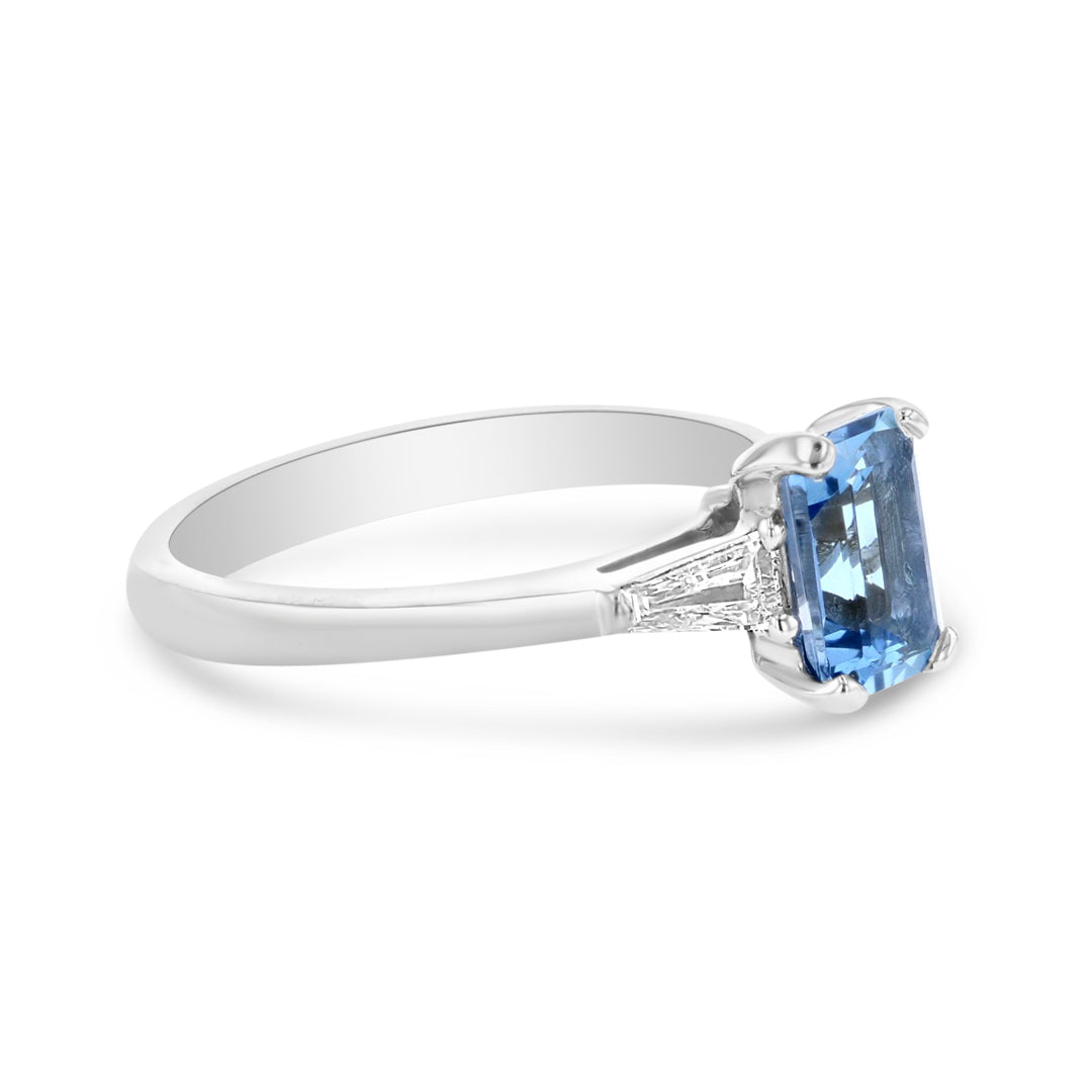 Blue Topaz and Tapered Baguette Diamond Three Stone Ring