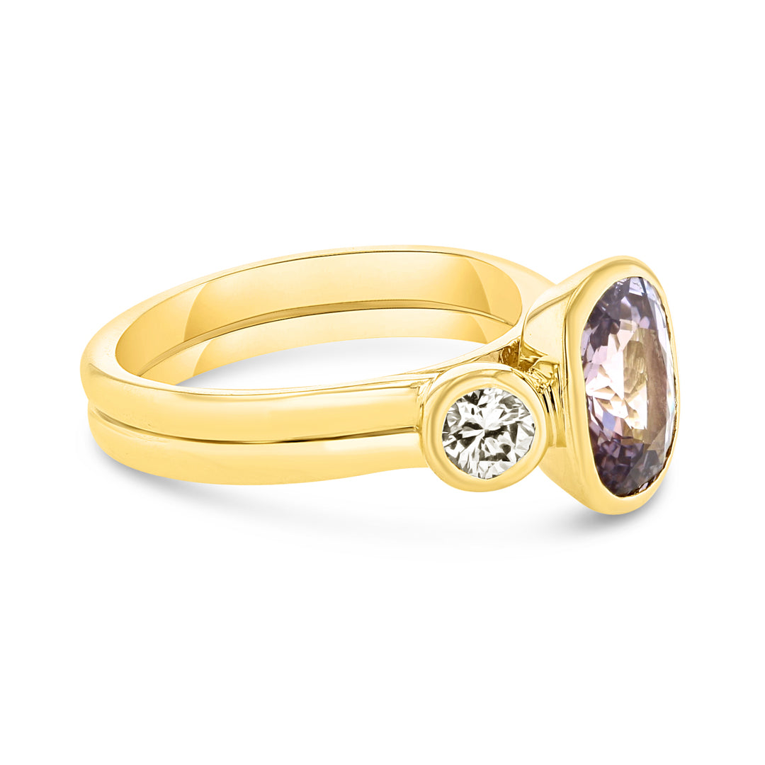 Three Stone Ring With Purple Sapphire and Diamonds