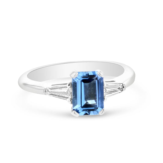 Blue Topaz and Tapered Baguette Diamond Three Stone Ring