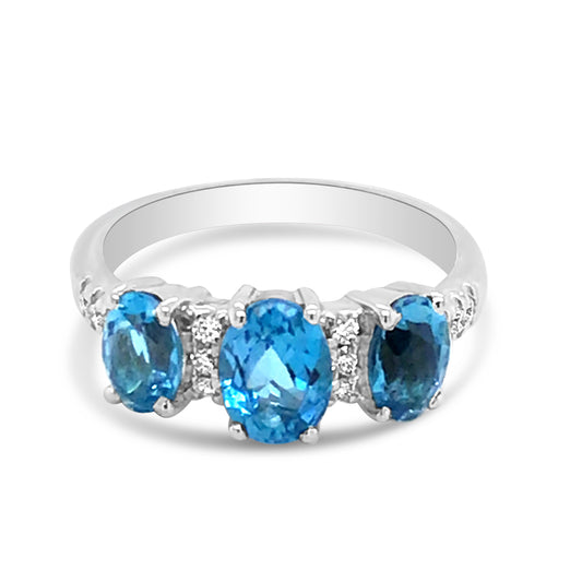 Three Stone Blue Topaz and Diamond Ring