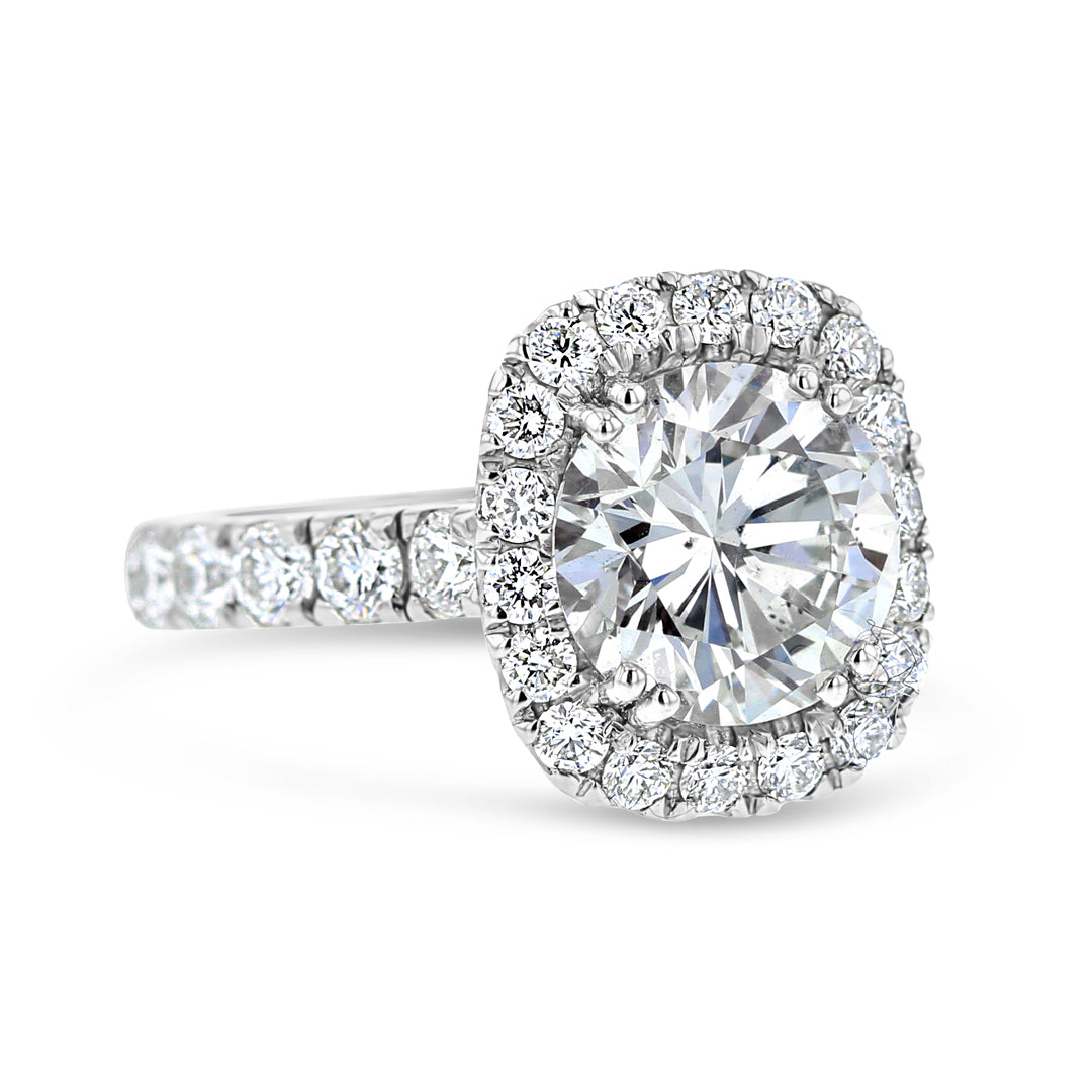 Engagement Ring with Radiant Shape Halo and Round Brilliant Cut Diamond