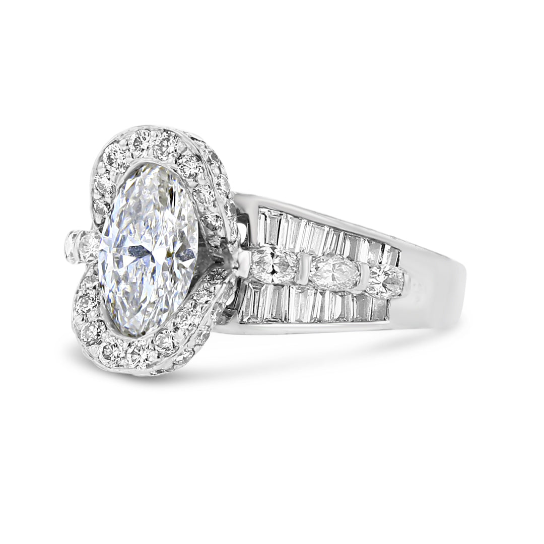 Platinum Marquise Diamond Ring With Oval Halo and Fancy Shank