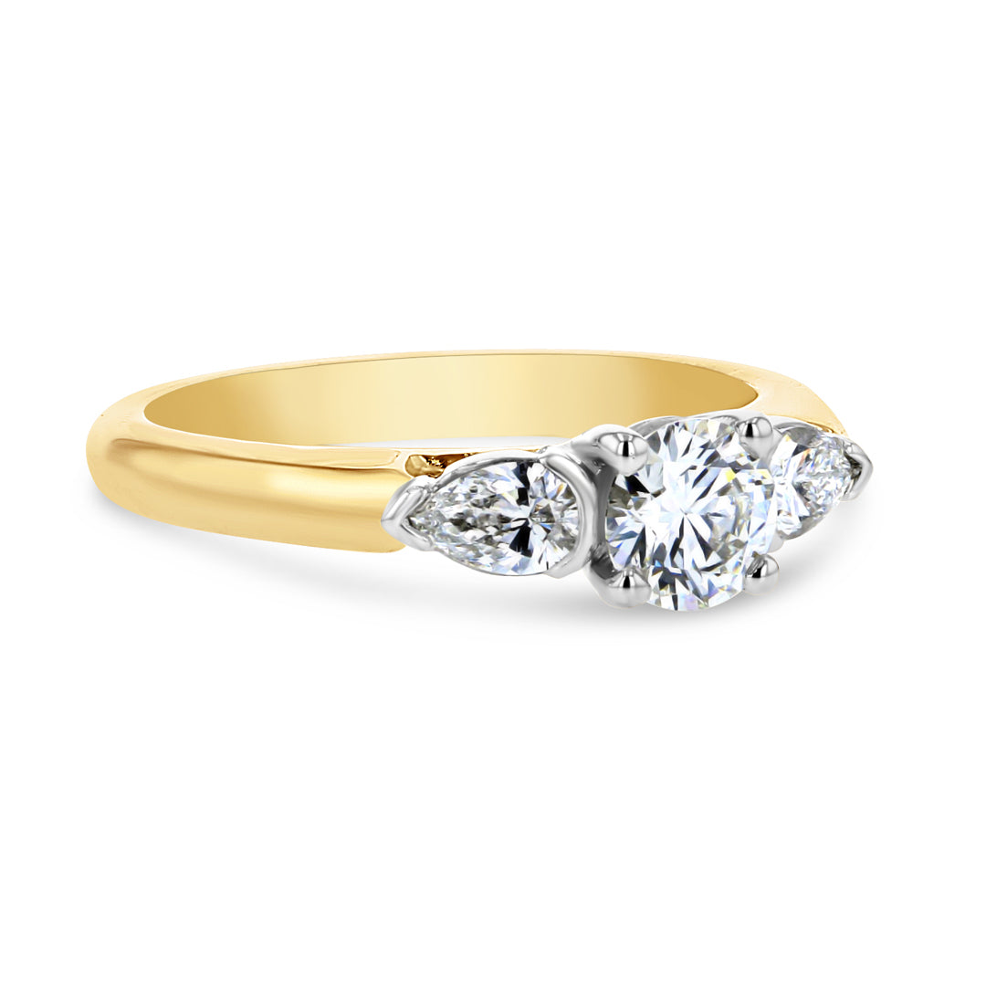 Three Stone Engagement Ring with Pear Shaped Side Diamonds