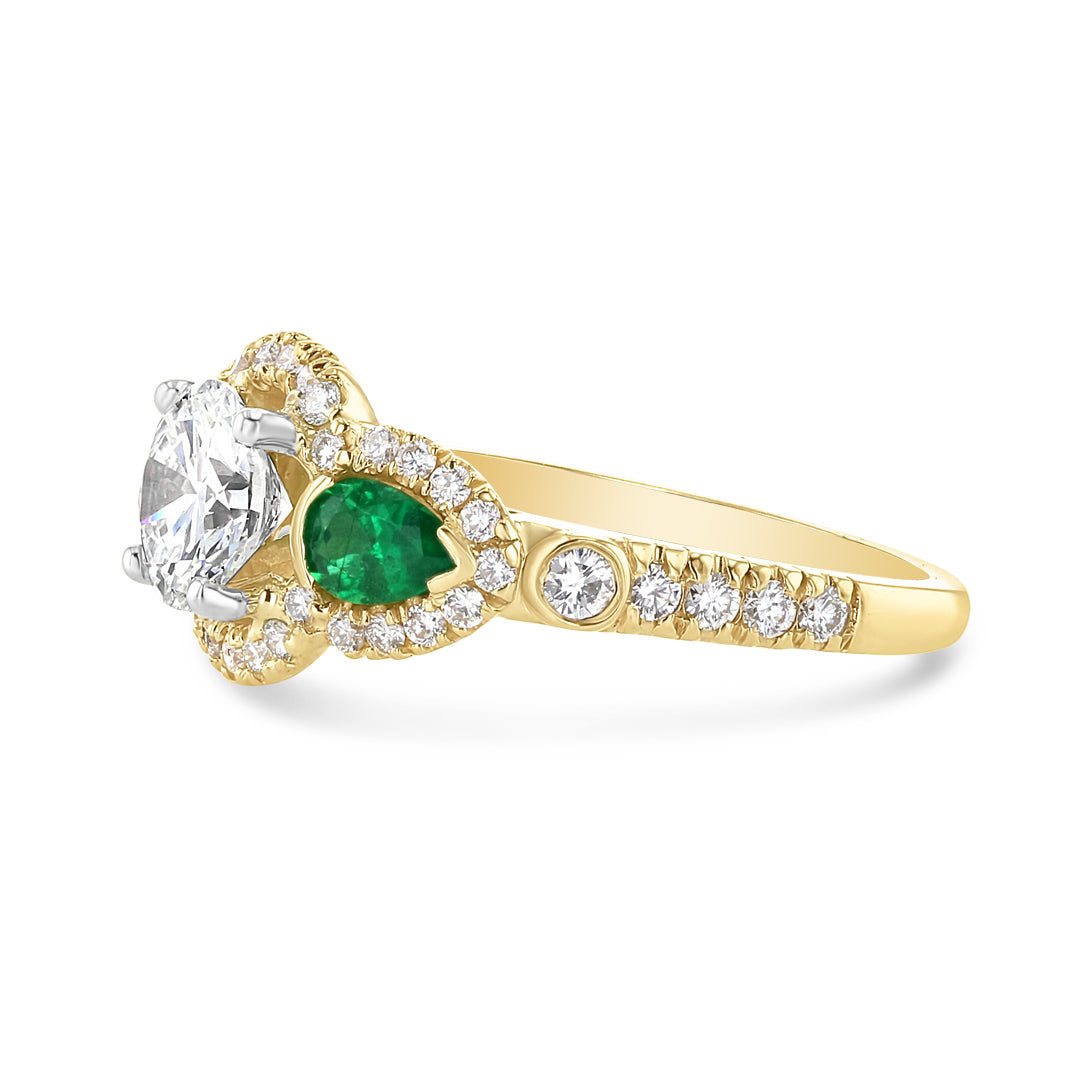 Emerald and Diamond Halo Engagement Ring